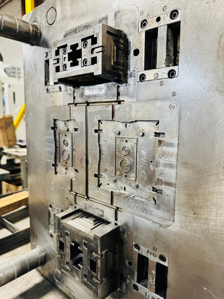 Injection mold tooling shown in the Fram Trak brochure