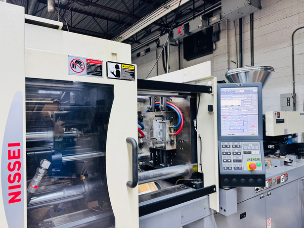 Nissei injection molding machine at Fram Trak